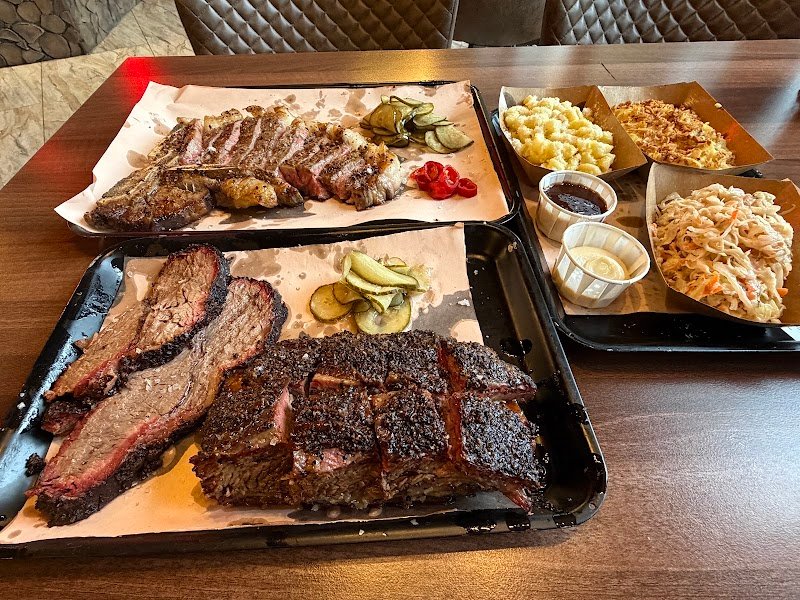Smoked meats on the pass at Koma Chophouse