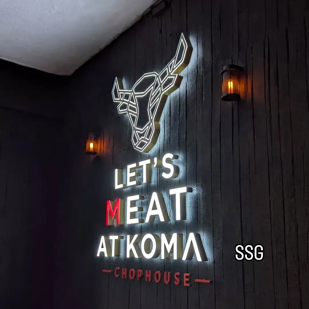 Let's meat at KOMA Chophouse — interior sign